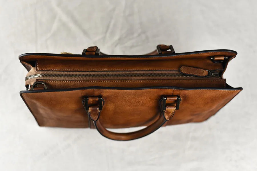 Men's 14-inch leather business handbag in horizontal square retro design with zipper closure