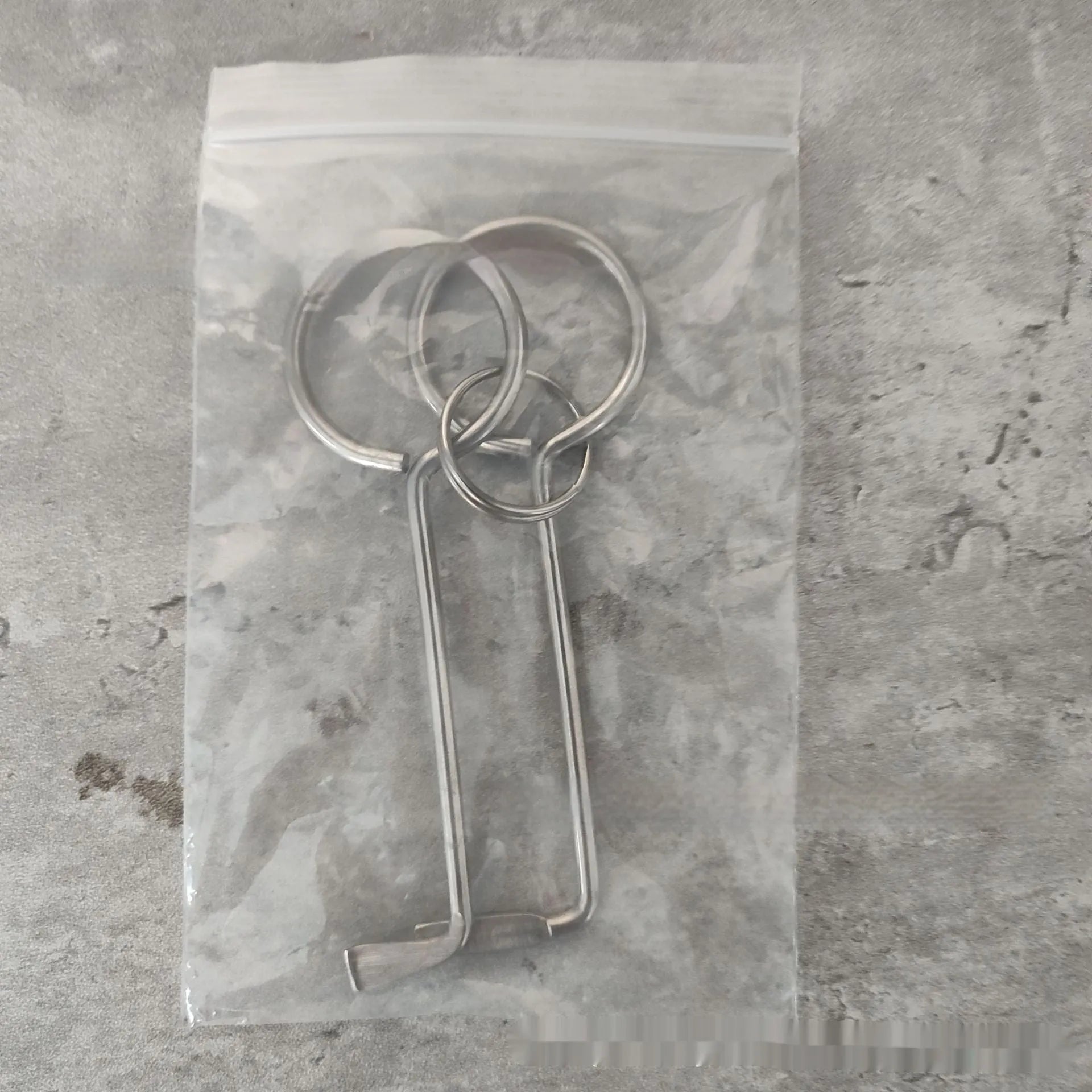 Two alloy steel wrench tools displayed as a portable set for household DIY repairs