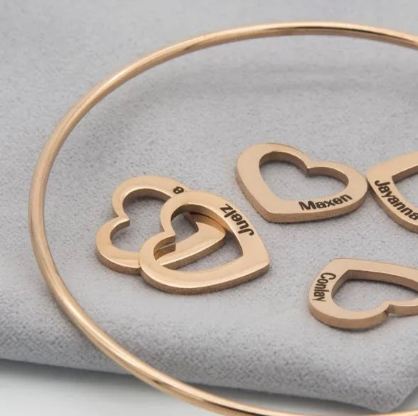 Love bracelet with peach heart charm and name lettering in stainless steel, silver colour