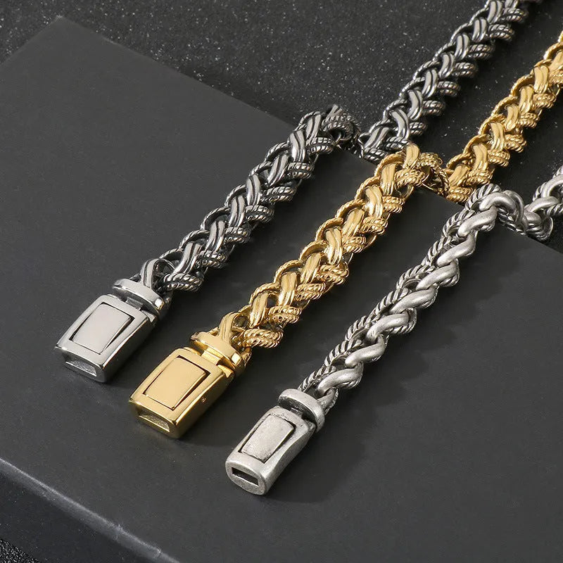 Men's antique silver titanium steel keel chain necklace with large hemp flower links on a grey background.