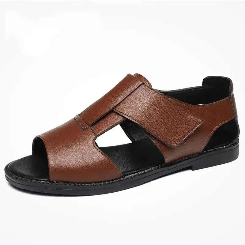 Men's black leather casual sandals with open toe and rubber sole on a plain background.