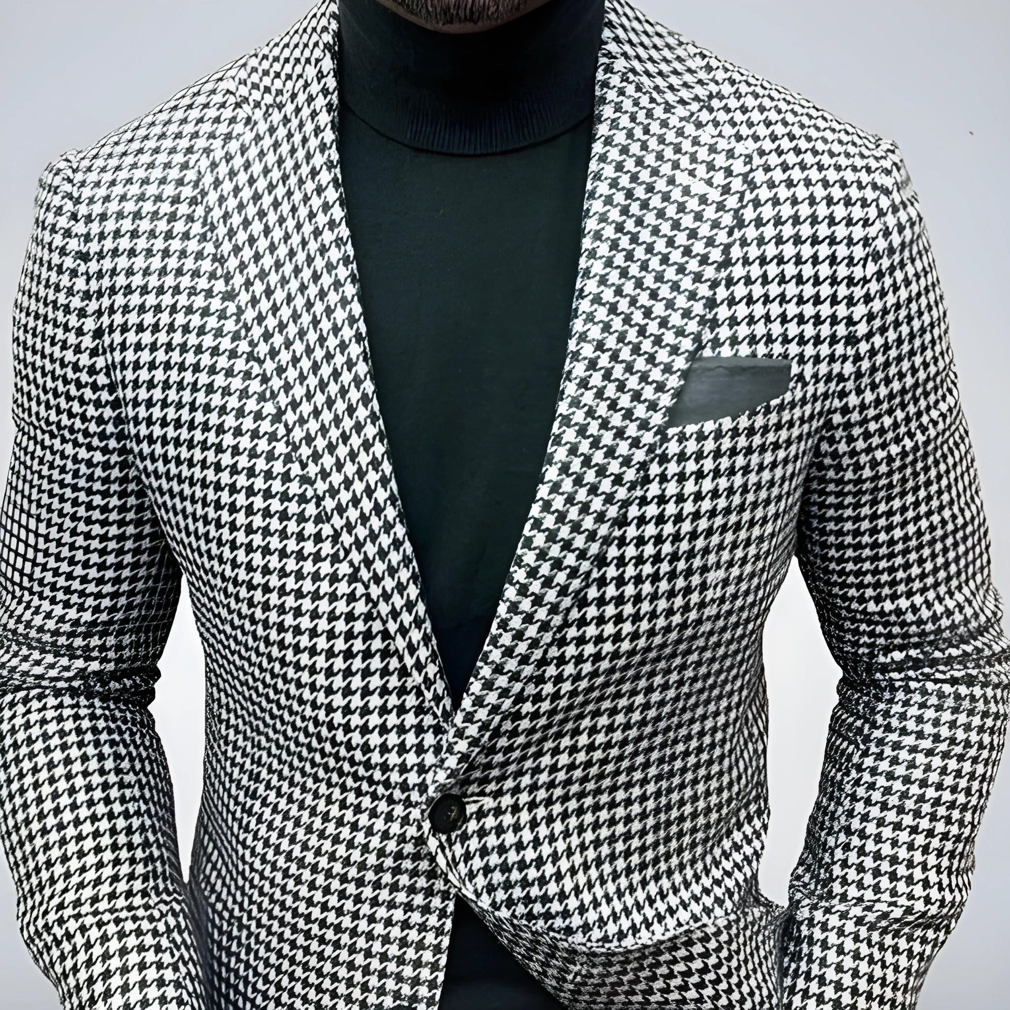 Men's slim fit two-button suit jacket with large top stitching pockets in a black button-split colour.