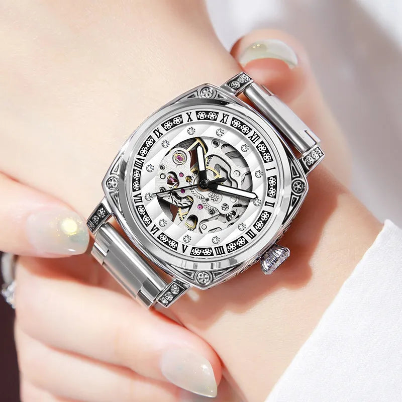 Leather strap mechanical watch with luminous hands showing black, red, steel strip and white colour options