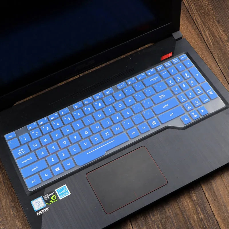 ASUS Flight laptop keyboard protective film cover shown in gradient blue on a laptop