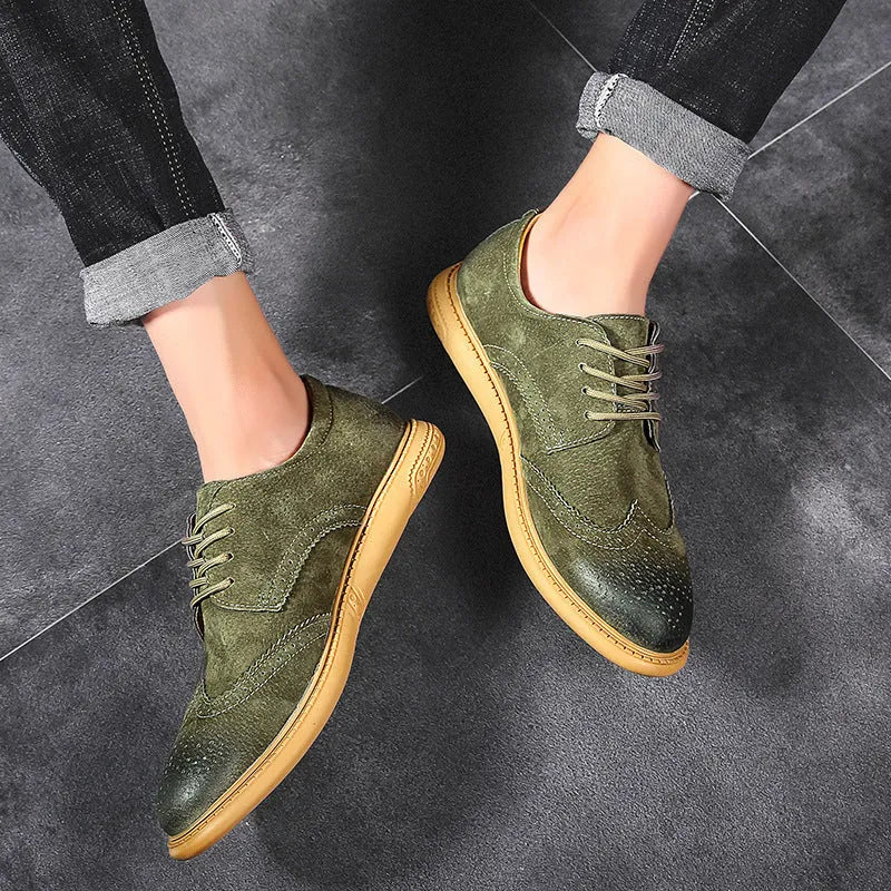 Men's grey low-top leather business shoes with lace-up design and non-slip rubber sole.