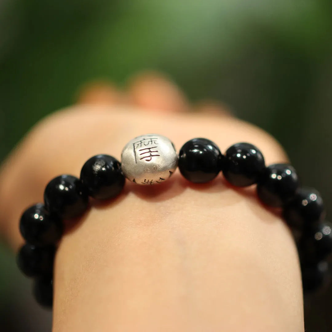 10mm black agate bracelet with sterling silver detailing in Chinese ethnic design style