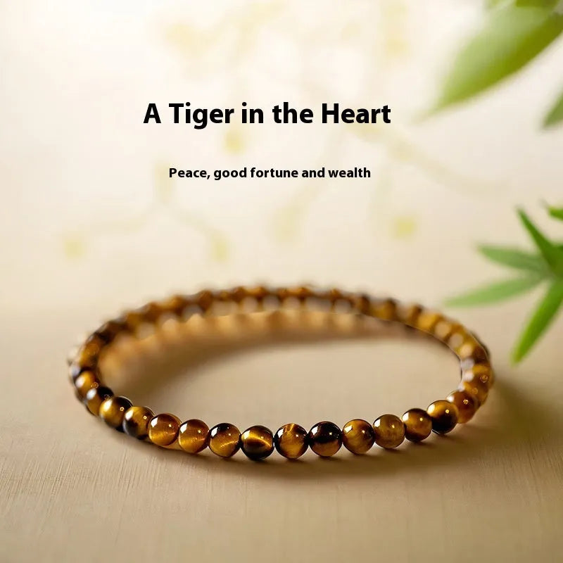 New Chinese style Tigereye bracelet with spherical beads in geometric design.