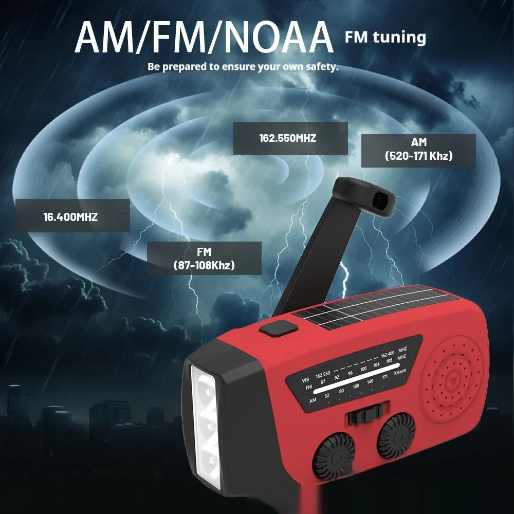 Red rechargeable hand torch radio with wrist strap, showing USB charging port and compact size.