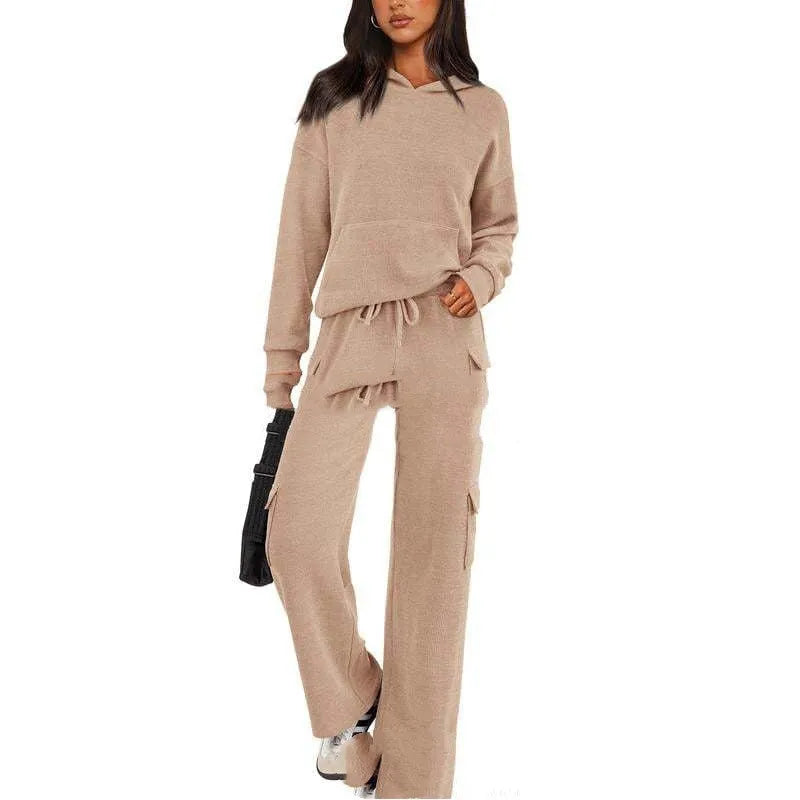 Women's polyester leisure sports suit with regular sleeves and matching trousers in multiple colour options