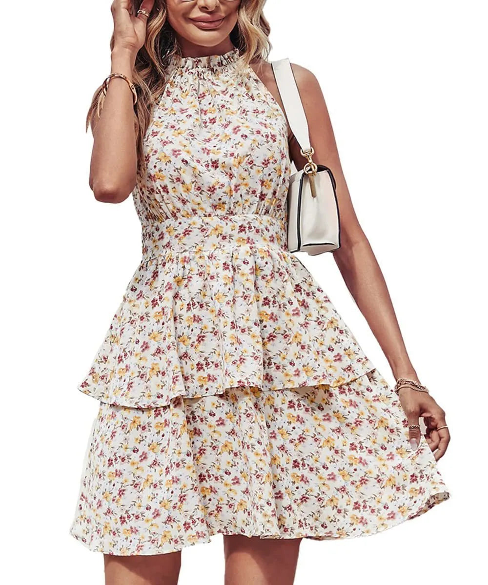 Women's boho-style backless halter dress with ruffled A-line skirt in a printed pattern.