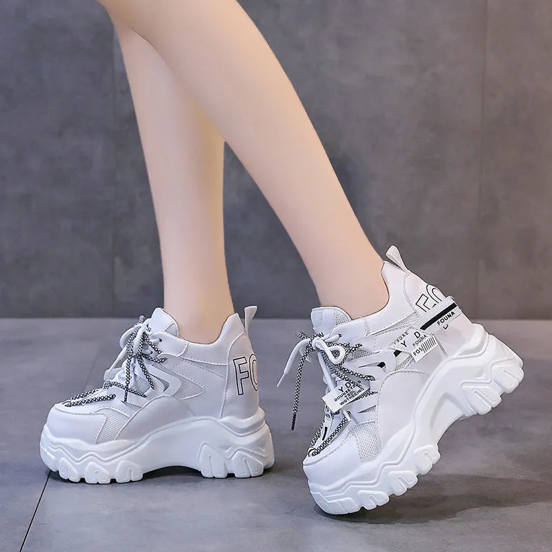 Women's white and black mesh platform sports shoes with cross-strap design and 6-8cm heel