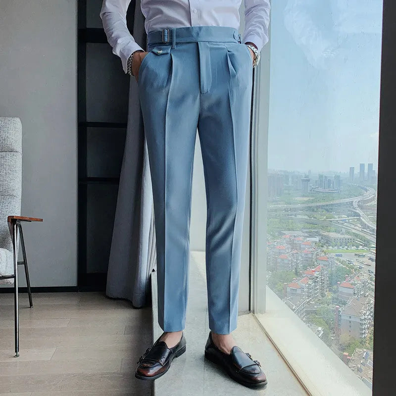 Straight-leg solid colour casual trousers in polyester on a size chart showing waist sizes 29 to 36.