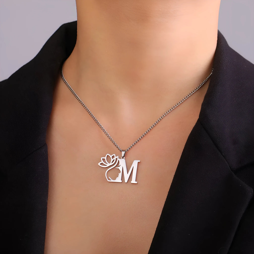 Stainless steel necklace with cross chain and a single initial letter pendant in gold tone.