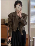Brown women's retro slim-fit leather coat jacket with long sleeves and pockets.