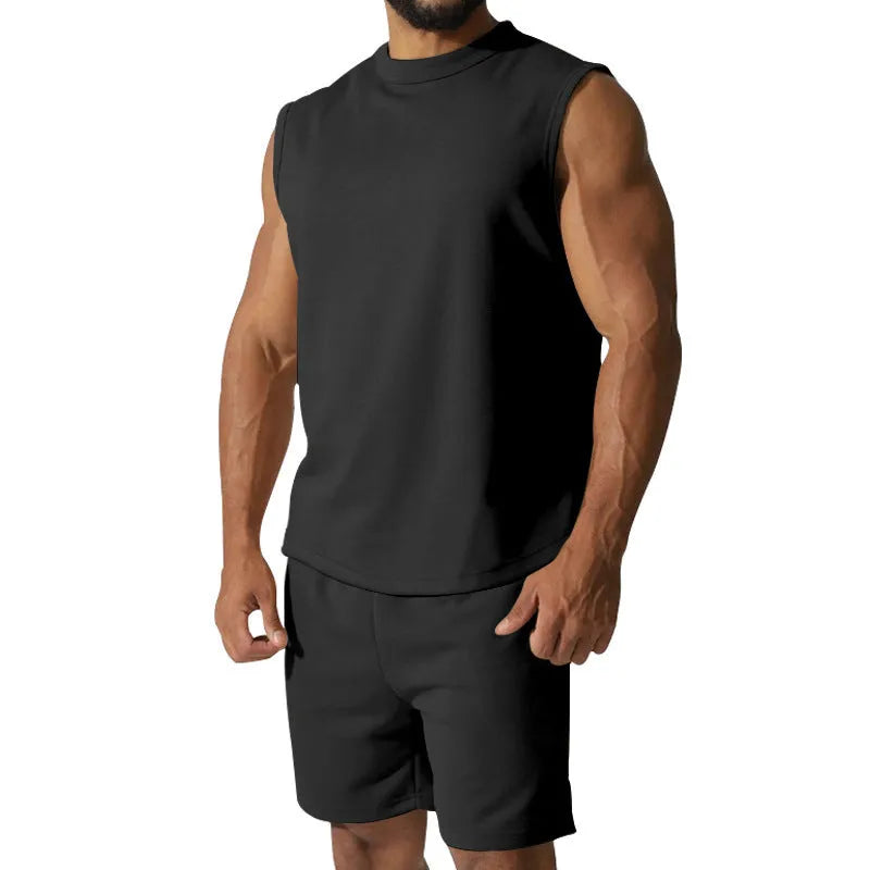 Men's sleeveless cotton blend sports top and matching shorts in solid colour options