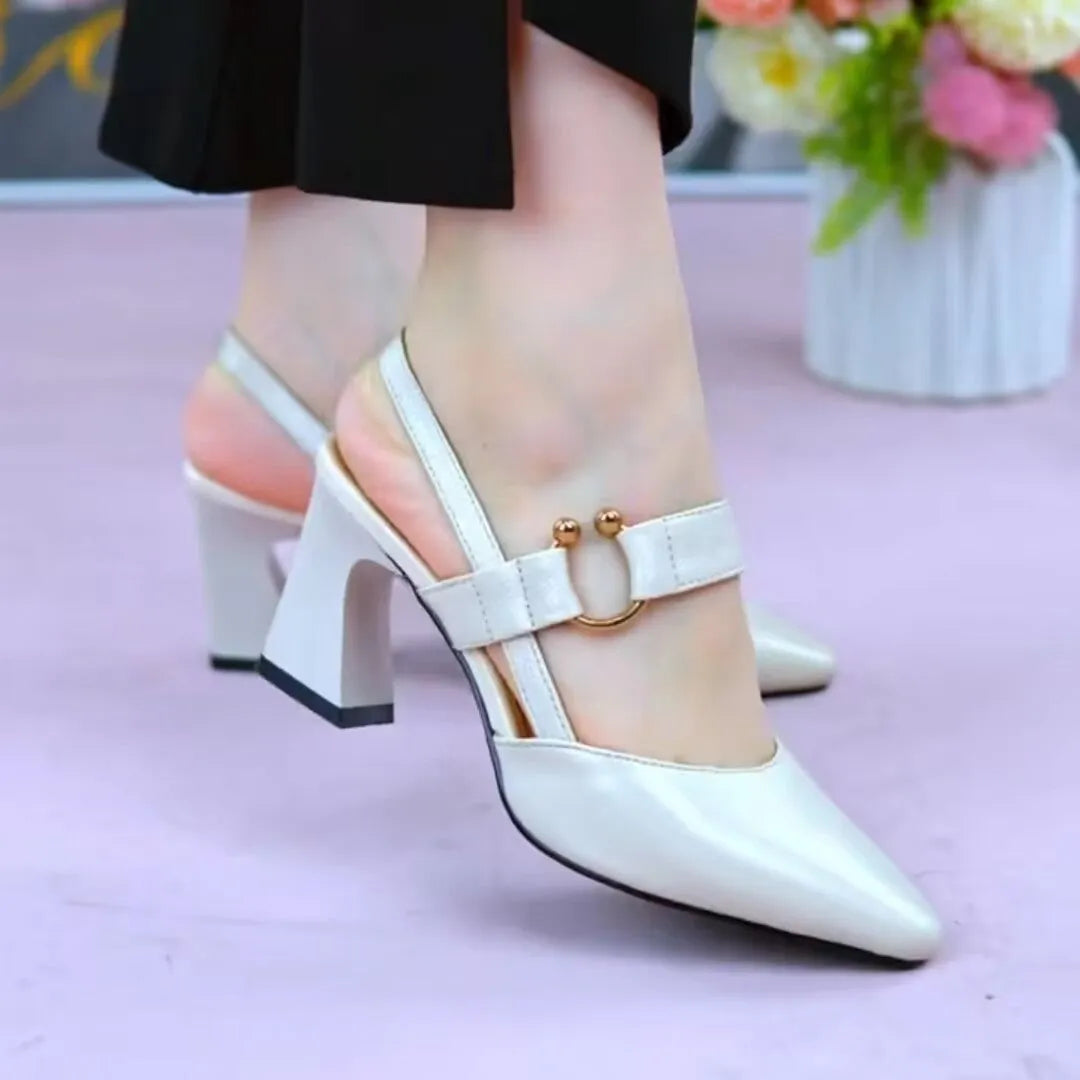 Women's apricot leather closed-toe sandals with a chunky heel and backless slip-on design.