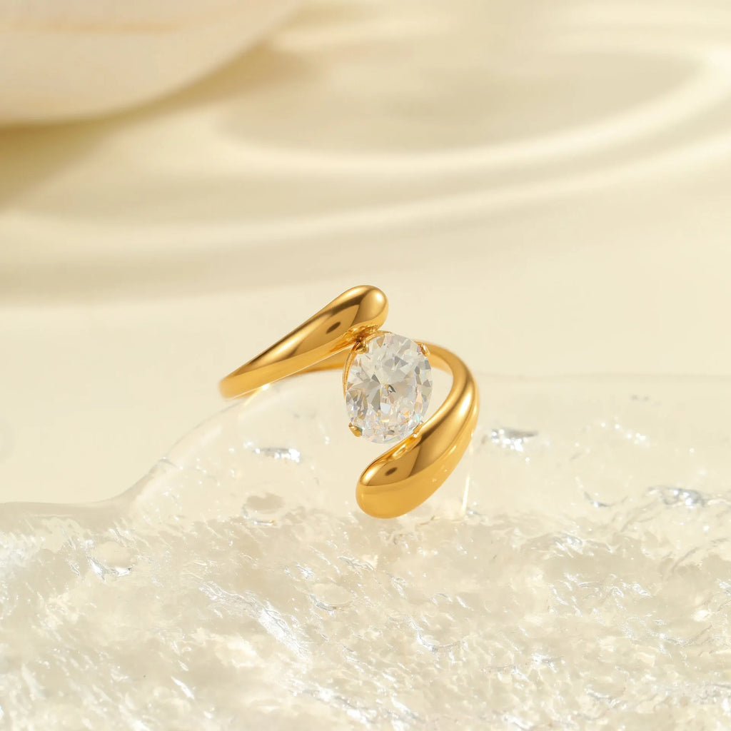 Geometric stainless steel zircon ring with open mouth design showing round, oval and quadrangle elements