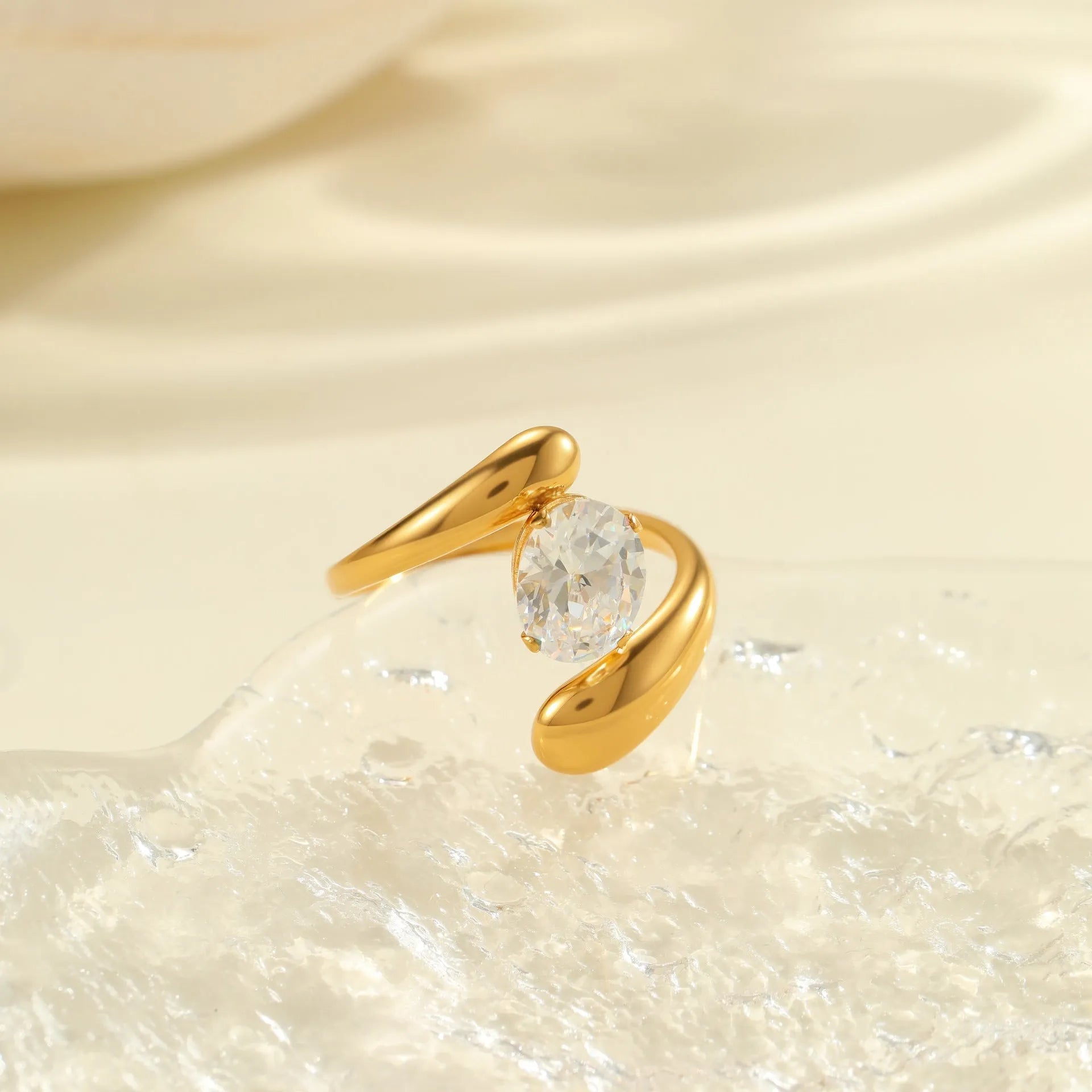 Geometric stainless steel zircon ring with open mouth design showing round, oval and quadrangle elements