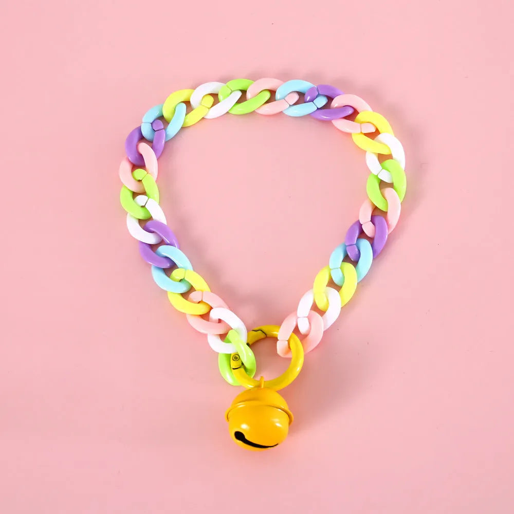 Plastic monochrome chain pet collar shown in chain blue, pink, and mixed colours for S and M sizes.