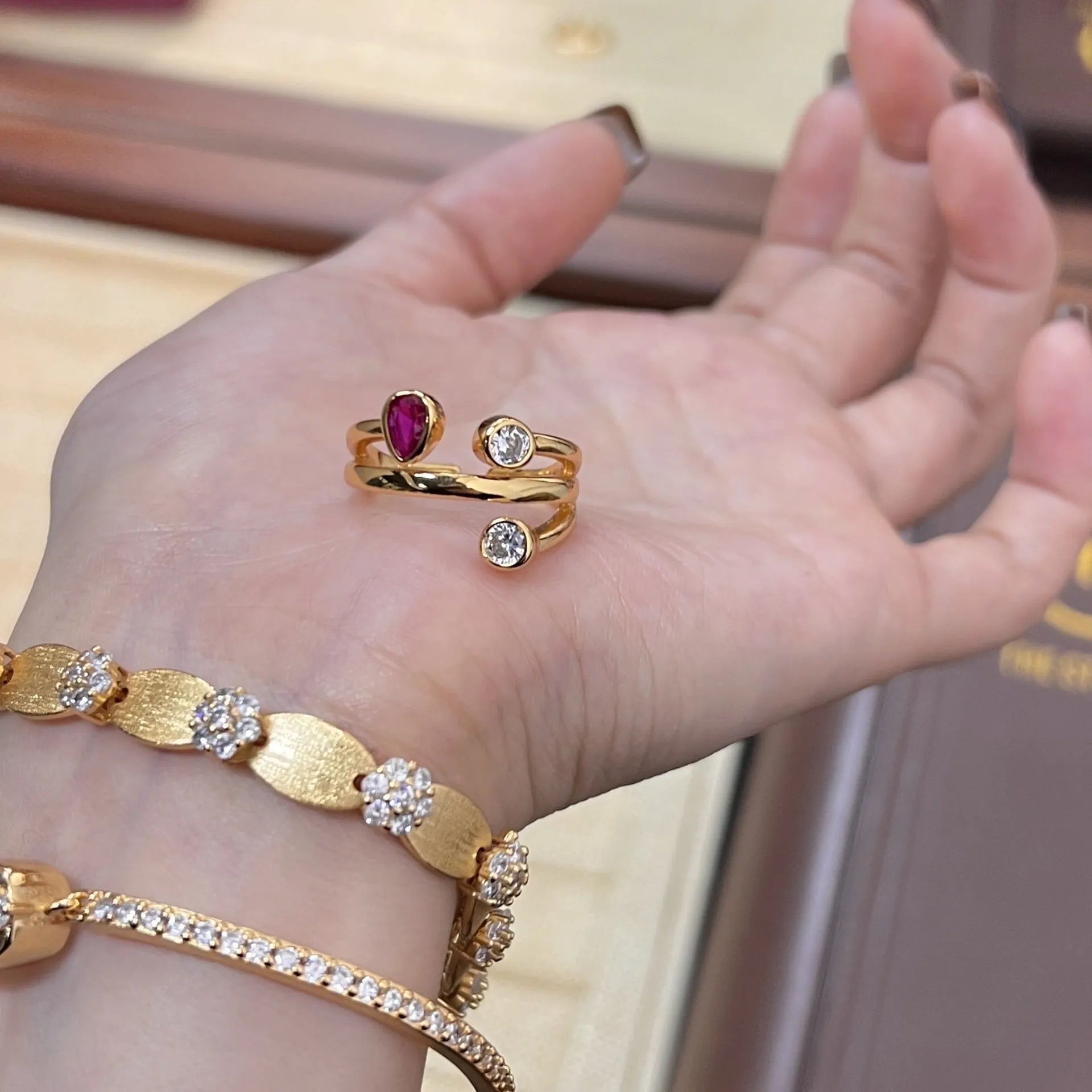Irregular cross two-colour diamond ring with double-headed geometric design