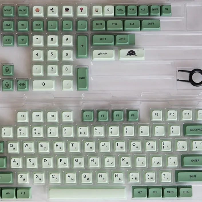 124 PBT keycaps in Matcha green colour arranged by language layout for mechanical keyboards