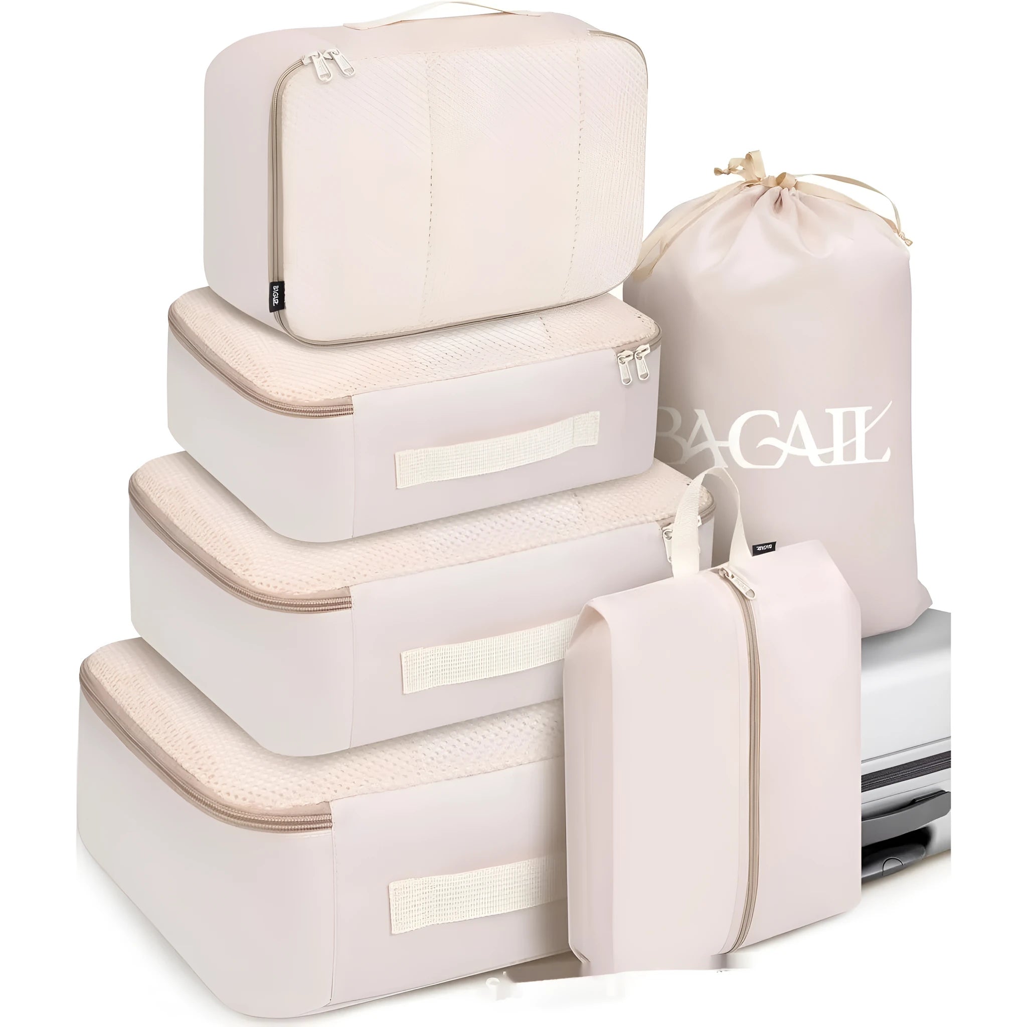 Set of eight PP packing cubes in various colours including beige, black, pink, and leopard print for travel organisation.