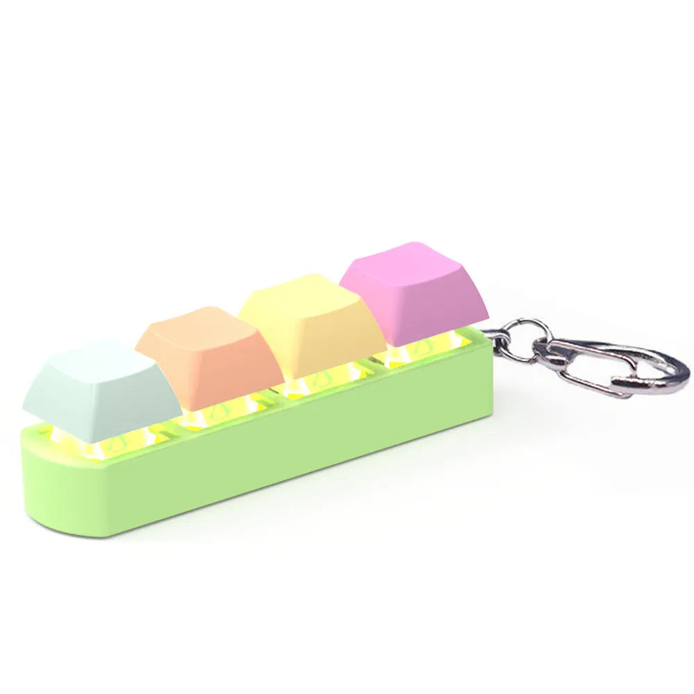 4-key keyboard shaft tester with transparent bottom shell measuring 22mm by 27mm by 85mm