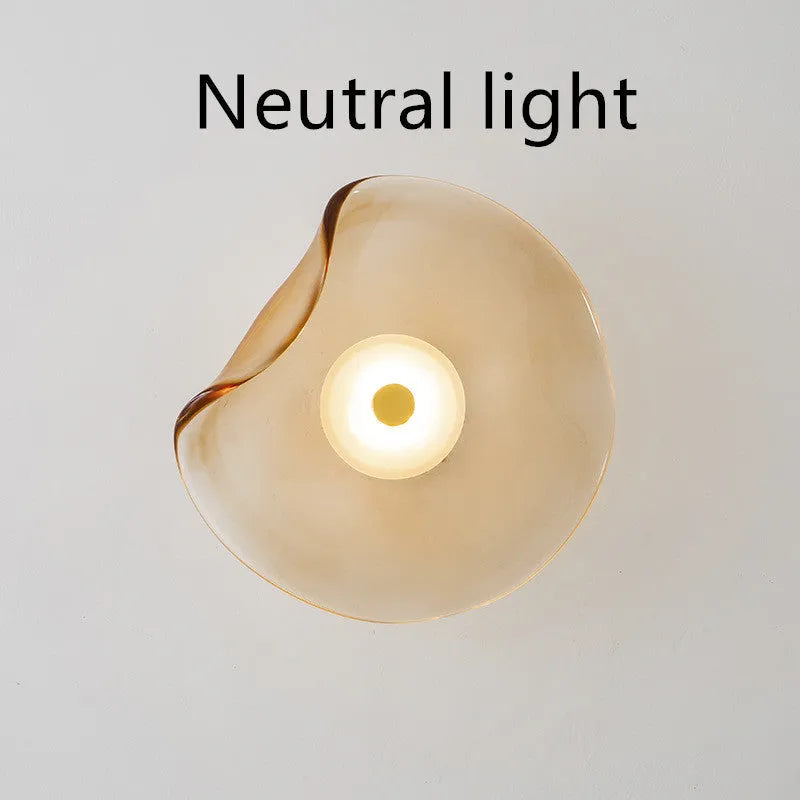Round decorative wall lamp with glass shade for bedroom bedside lighting