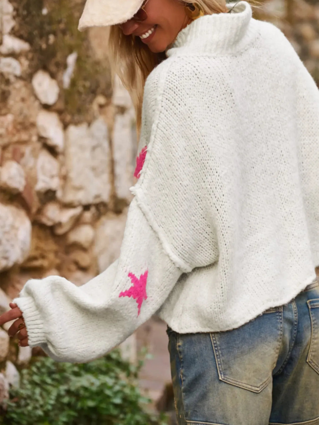 White women's loose turtleneck pullover with a black star pattern on thick imitation velvet fabric