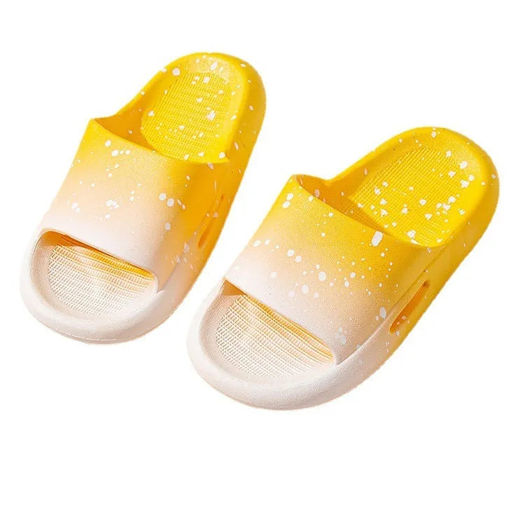 Gradient coloured children's PVC summer slippers with non-slip soles in blue, yellow, green, orange, pink, or black.