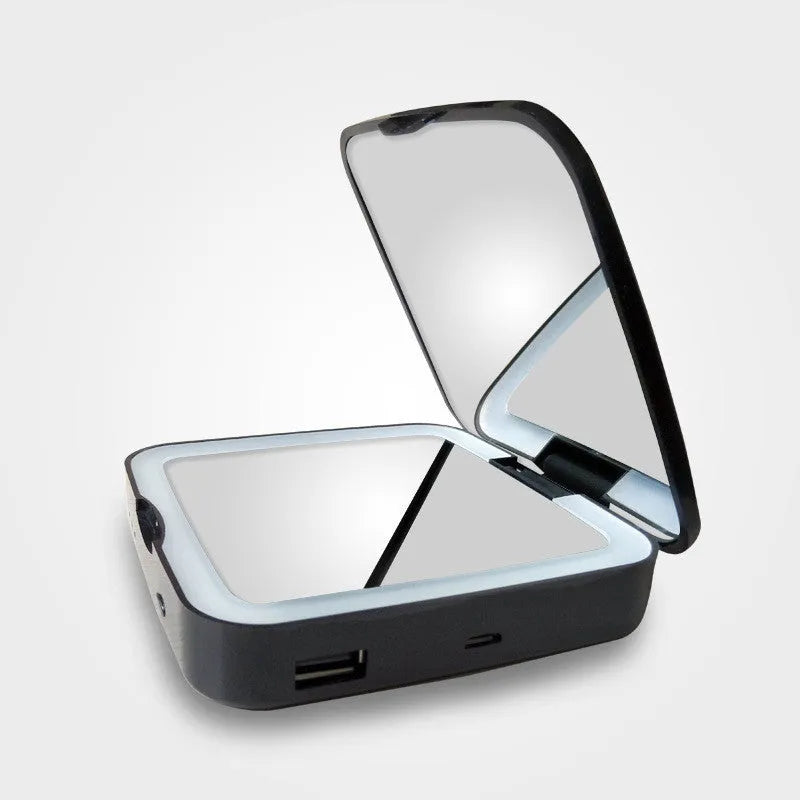 Makeup mirror with magnification and adjustable lighting in black or white colour