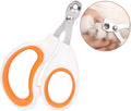 Blue pet nail clippers with circular cutting hole and cushioned non-slip handles on a white background.