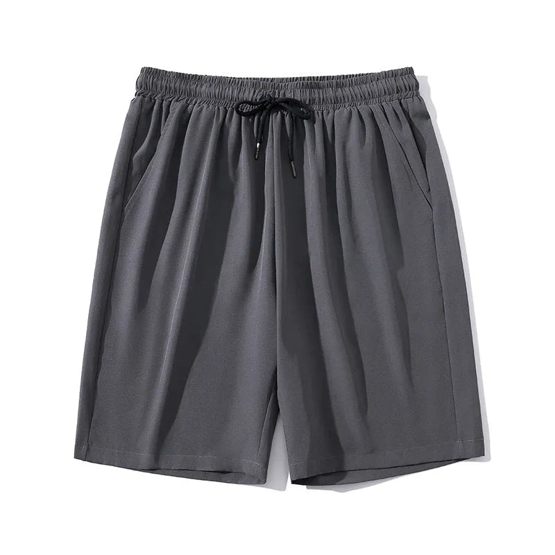 Men's straight-leg cropped sports pants in quick-dry nylon fabric, shown in khaki colour.