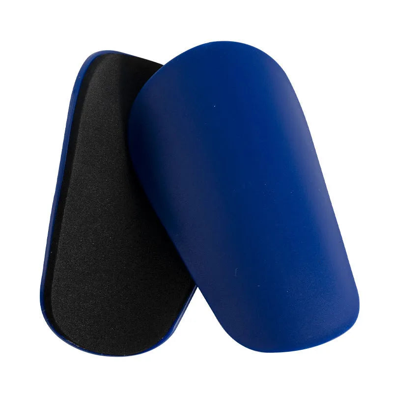 PU mini shin guards for sports in black, white, red and blue colours