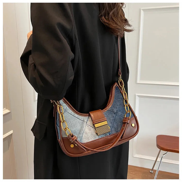 Brown denim women's shoulder bag with chain detailing and bucket shape design