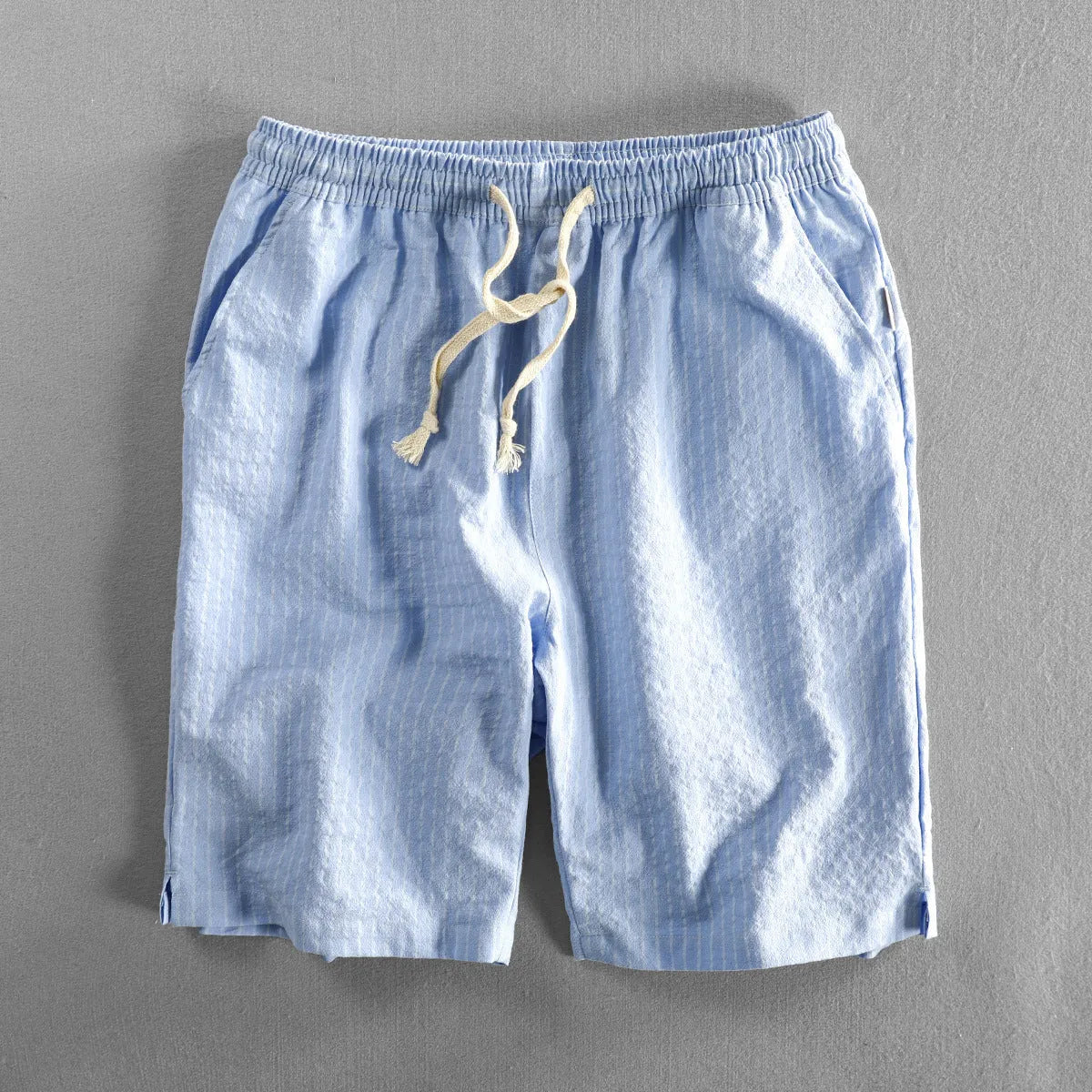 Men's striped cotton casual shorts in light blue with straight leg and mid waist design