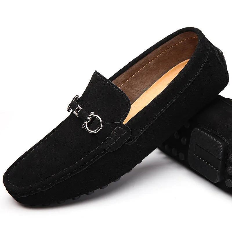 Men's black slip-on cowhide leather shoes with a square toe and flat heel on a white background