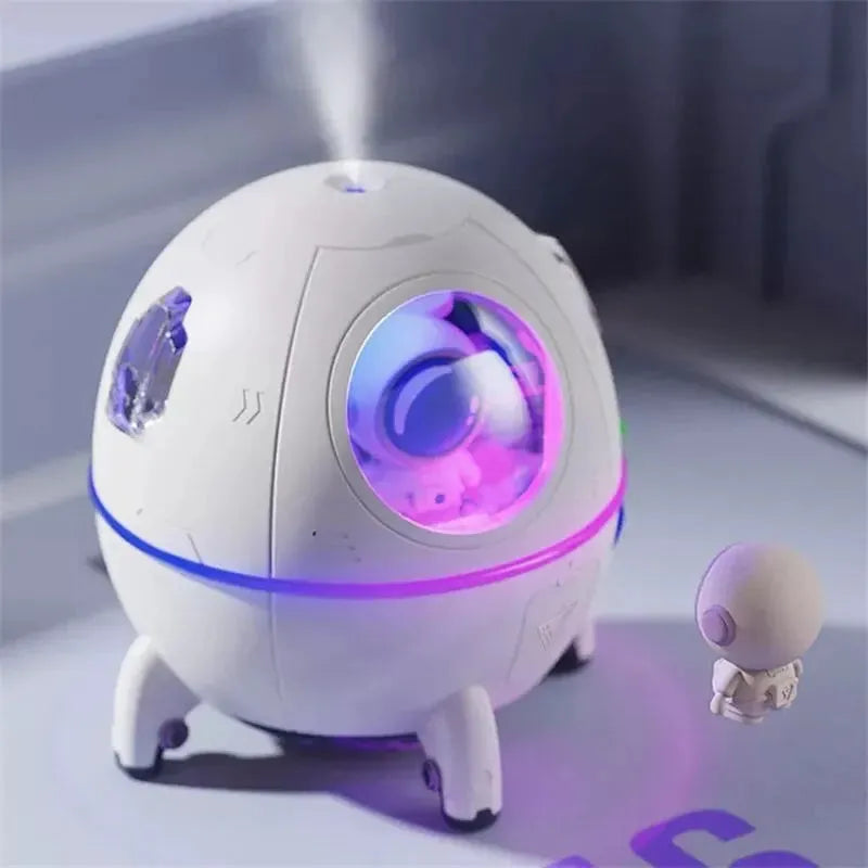 Astronaut-themed portable desktop humidifier with USB cable and colourful LED lighting