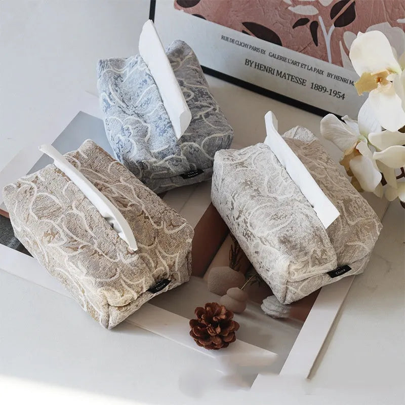 Cotton floral tissue box in beige, blue, or brown on a wooden table.