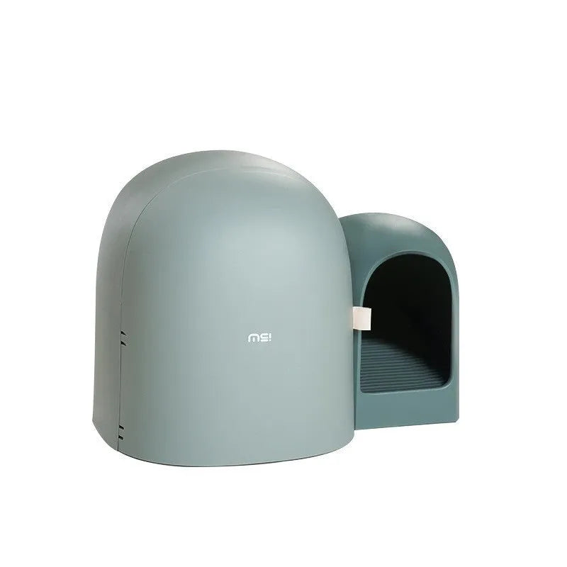 Large white fully enclosed cat litter box with a hood, shown next to a cat for scale.