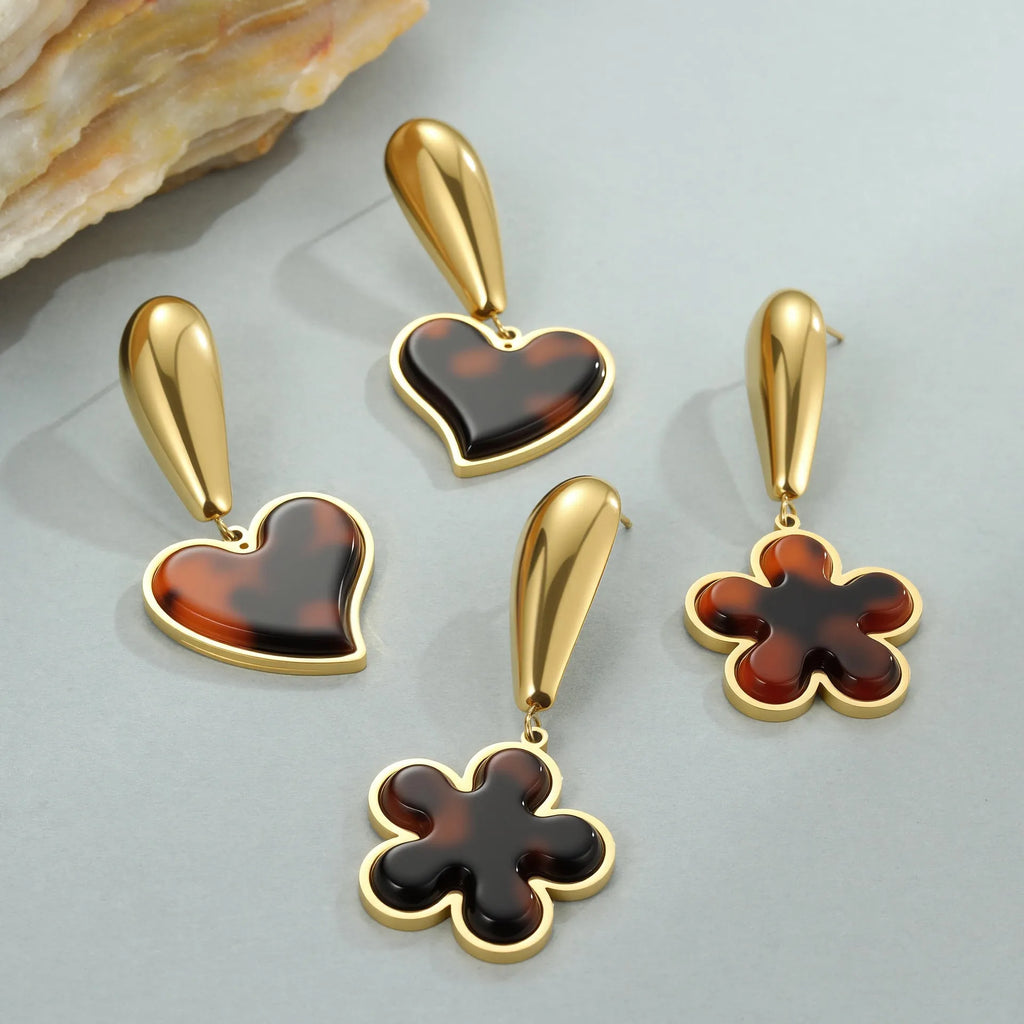 Women's tortoiseshell resin finish earrings with heart or flower designs in 18K gold electroplated stainless steel