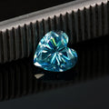 Heart-shaped moissanite stone in lemon yellow colour showing precise cut and dimensions