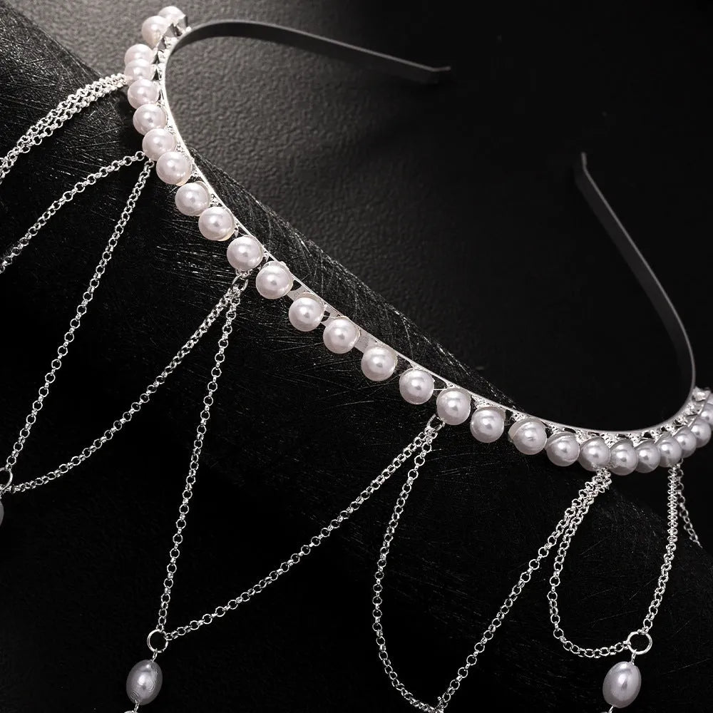 Women's mesh hair chain with electroplated gold finish, pearl elements, and tassel detailing