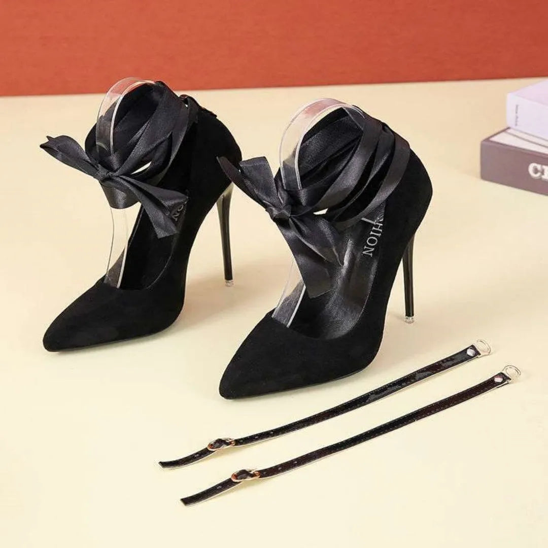 Women's black pointed toe platform heels with a thin fabric strap and a 12cm heel.