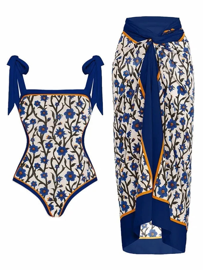 Women's printed floral two-piece swimsuit with a matching chiffon hip skirt.