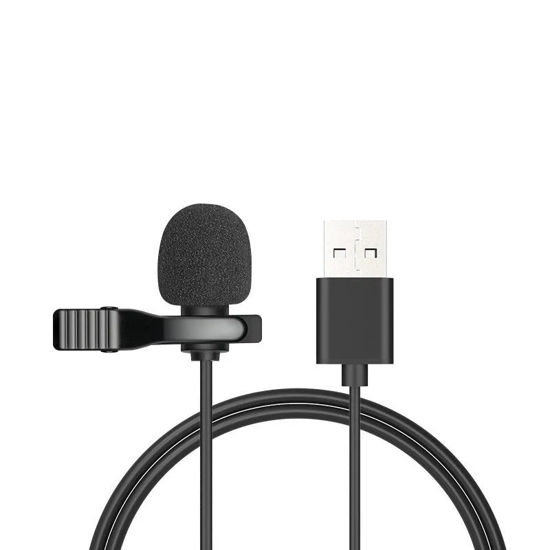White lavalier lapel clip microphone with long cable and in-ear earpieces next to an iPhone.