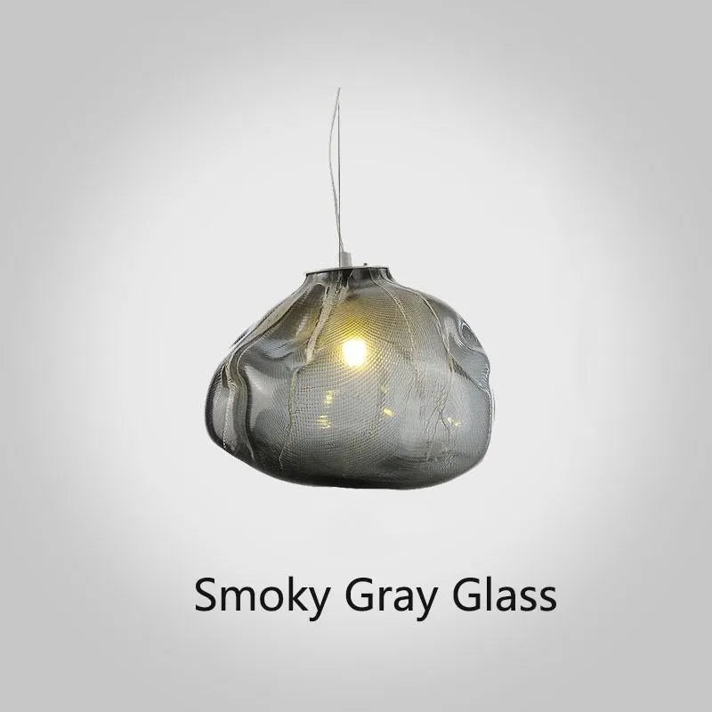 Modern fabric chandelier with glass shade shown in small and large sizes with clear, amber, and smoke grey light options.