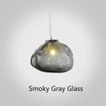 Modern fabric chandelier with glass shade shown in small and large sizes with clear, amber, and smoke grey light options.