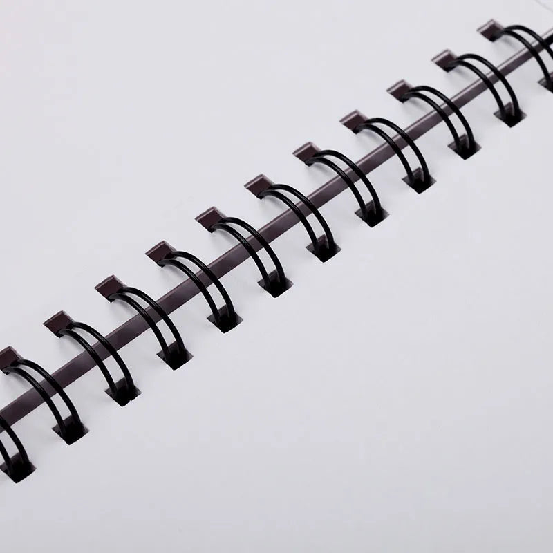 A4 sketch book with coil binding showing lay-flat pages, available in multiple paper weights and sizes for drawing