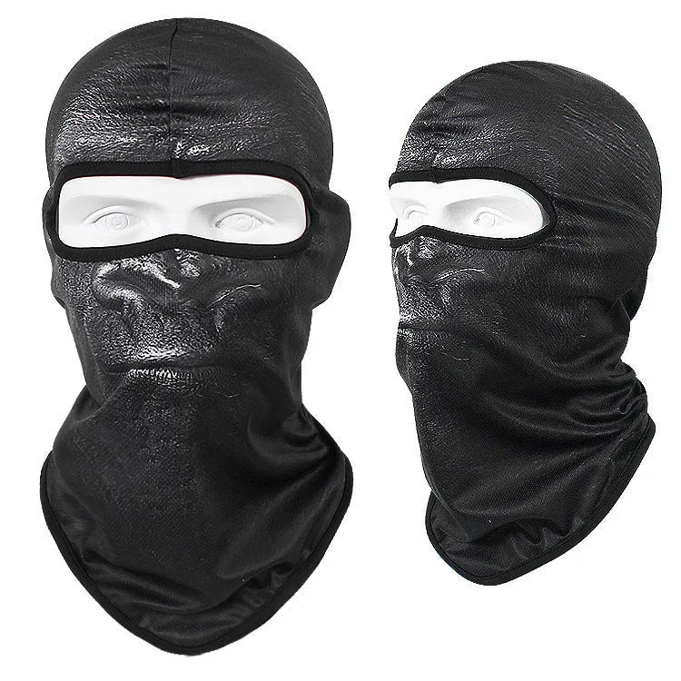 Breathable Bakool silk motorcycle skull mask in a graphic design, laid flat showing its 36cm by 29cm size.